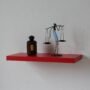 24in red single wall shelf for storage and display