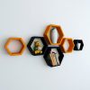 designer wall racks black orange for home decor